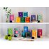 On display are all the tea packages of the Happiness Is series. They are placed on a shelf and are divided on two floors.